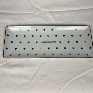Williams Sonoma Love is Love tray with gold trim and multicolored hearts.